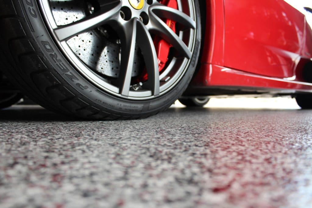 Premium residential epoxy garage floor with custom color flakes